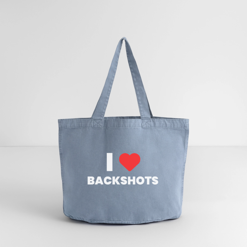 Die Rückseite der hellblauen Stofftasche zeigt sich in plastischer Optik vor einer weißen Studiowand. Das zentrierte rote Valentinsherz mit dem schlüpfrigen Subkultur-Humor sorgt dafür, dass dieser Shopper im Vorbeigehen von jeder Seite die Blicke auf sich zieht.