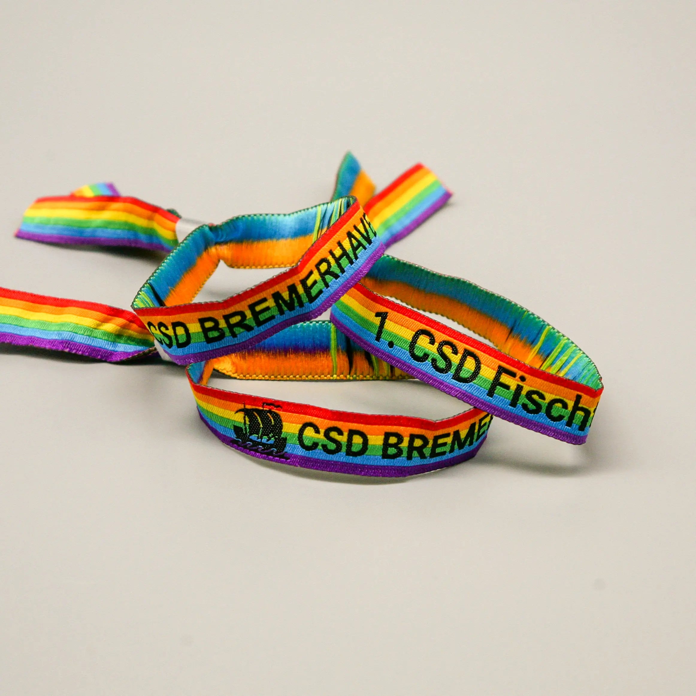 Pride-Armband des CSD Bremerhaven 🌈 (Stoffarmband) - PrideMerch.de - Team Behinderte im Queer Cities e.V.