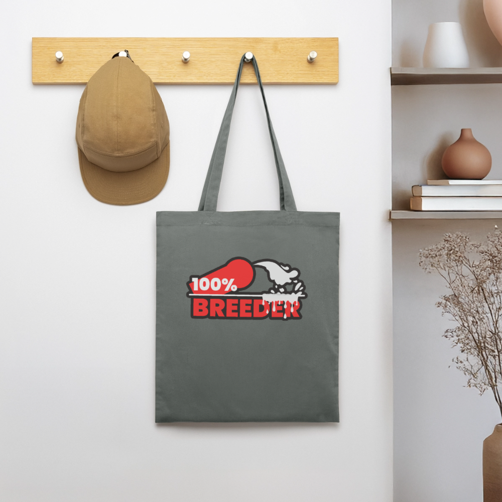 Anthrazitfarbener Bio-Stoffbeutel mit dominantem 100% Breeder Motiv in moderner Garderobe – selbstbewusstes Top Statement