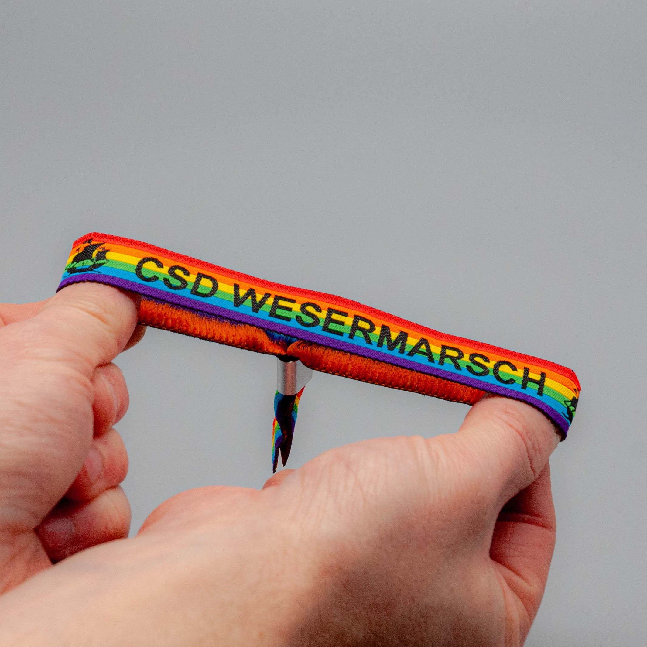 CSD Wesermarsch Armbändchen - PrideMerch.de - Team Behinderte im Queer Cities e.V.