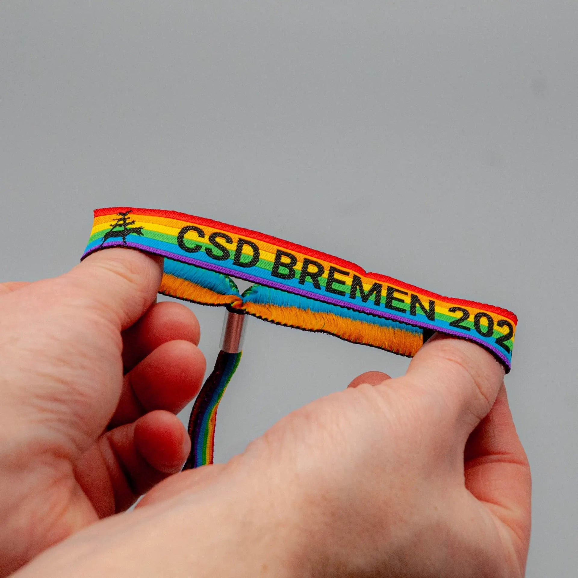 Pride-Armband des CSD Bremen 🌈 (Stoffarmband) - PrideMerch.de - Team Behinderte im Queer Cities e.V.