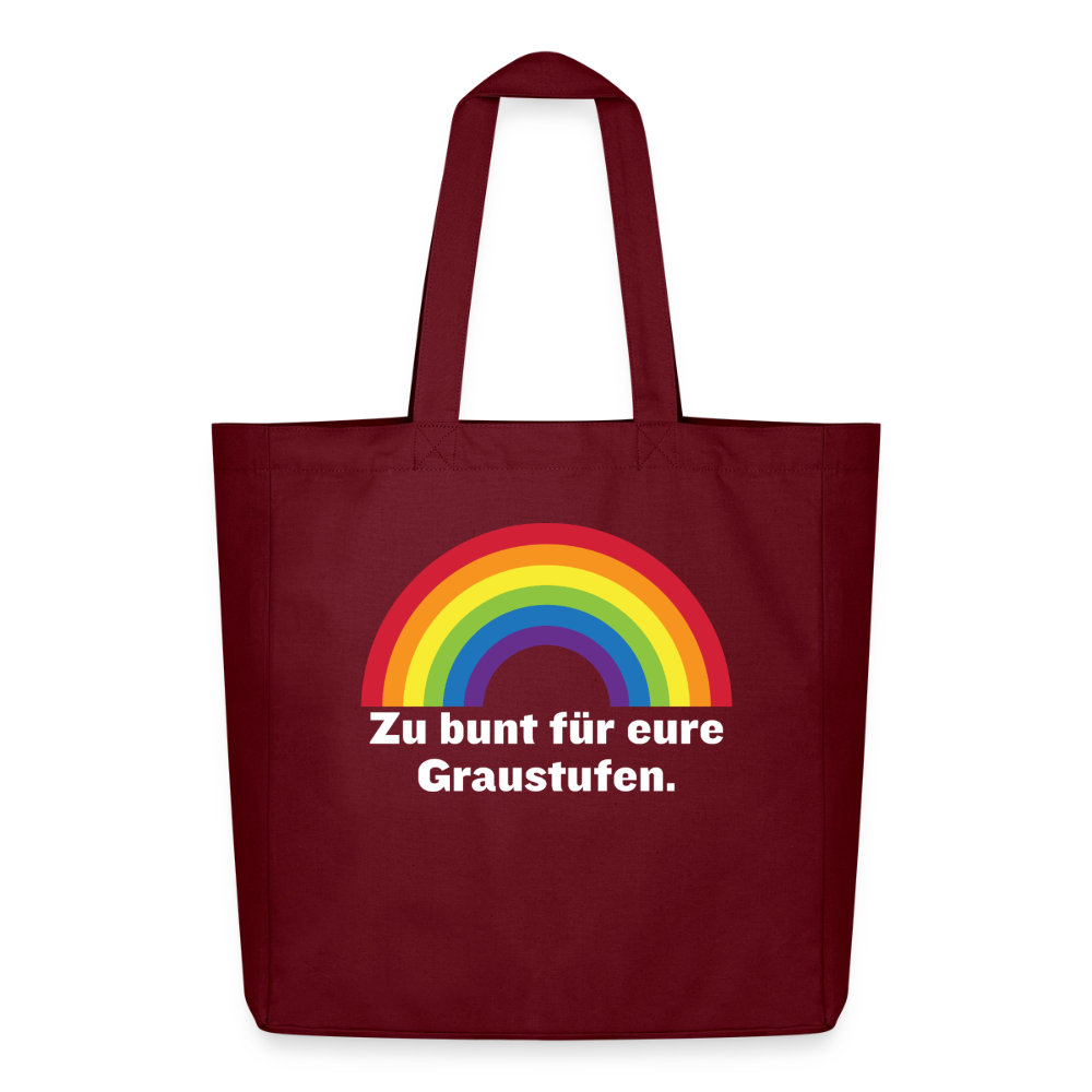 Burgunderrote Pride Tragetasche mit leuchtendem Regenbogen-Motiv und weißer Schrift, freigestellt