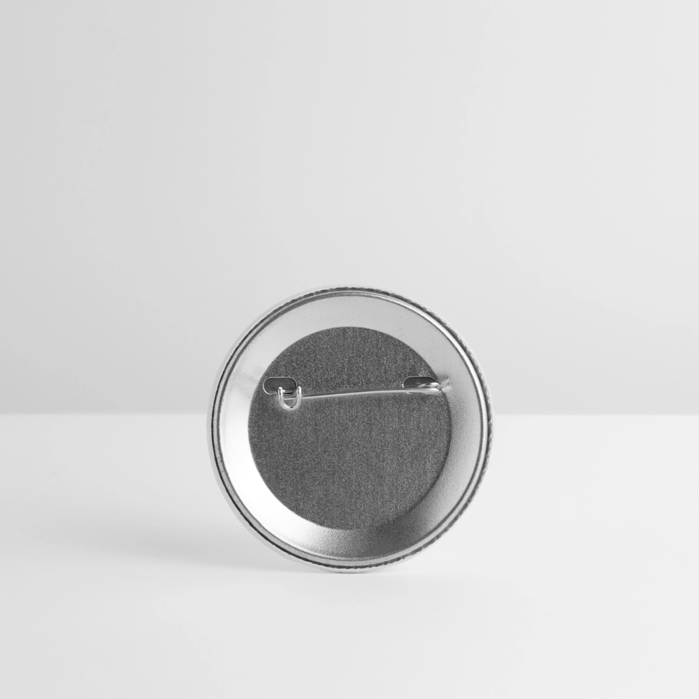 Detailansicht der Button-Rückseite. Zu sehen ist die klassische, silberne Metallnadel, mit der sich der Anstecker sicher an Rucksäcken, Taschen oder Jacken für den nächsten Pride befestigen lässt.