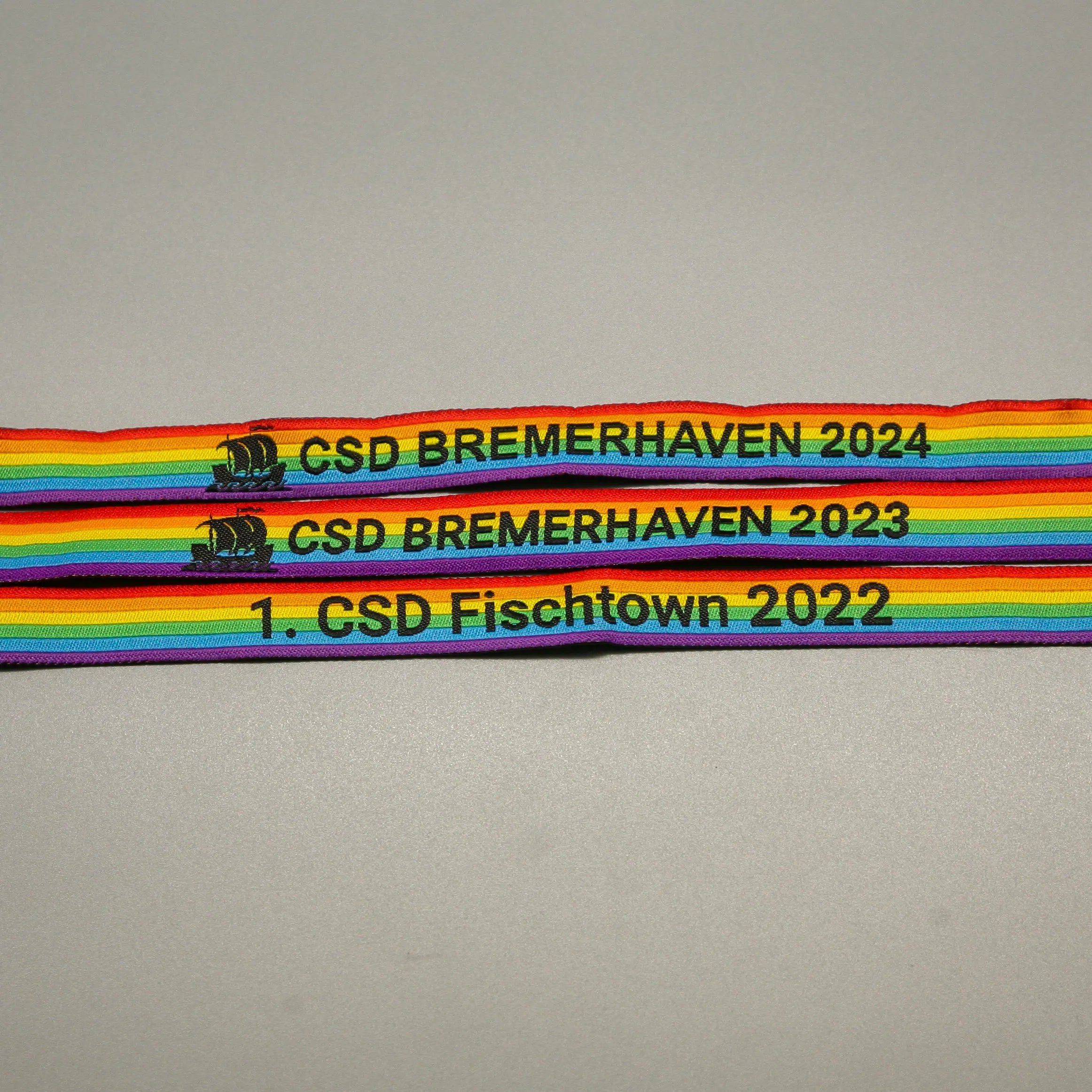 Pride-Armband des CSD Bremerhaven 🌈 (Stoffarmband) - PrideMerch.de - Team Behinderte im Queer Cities e.V.