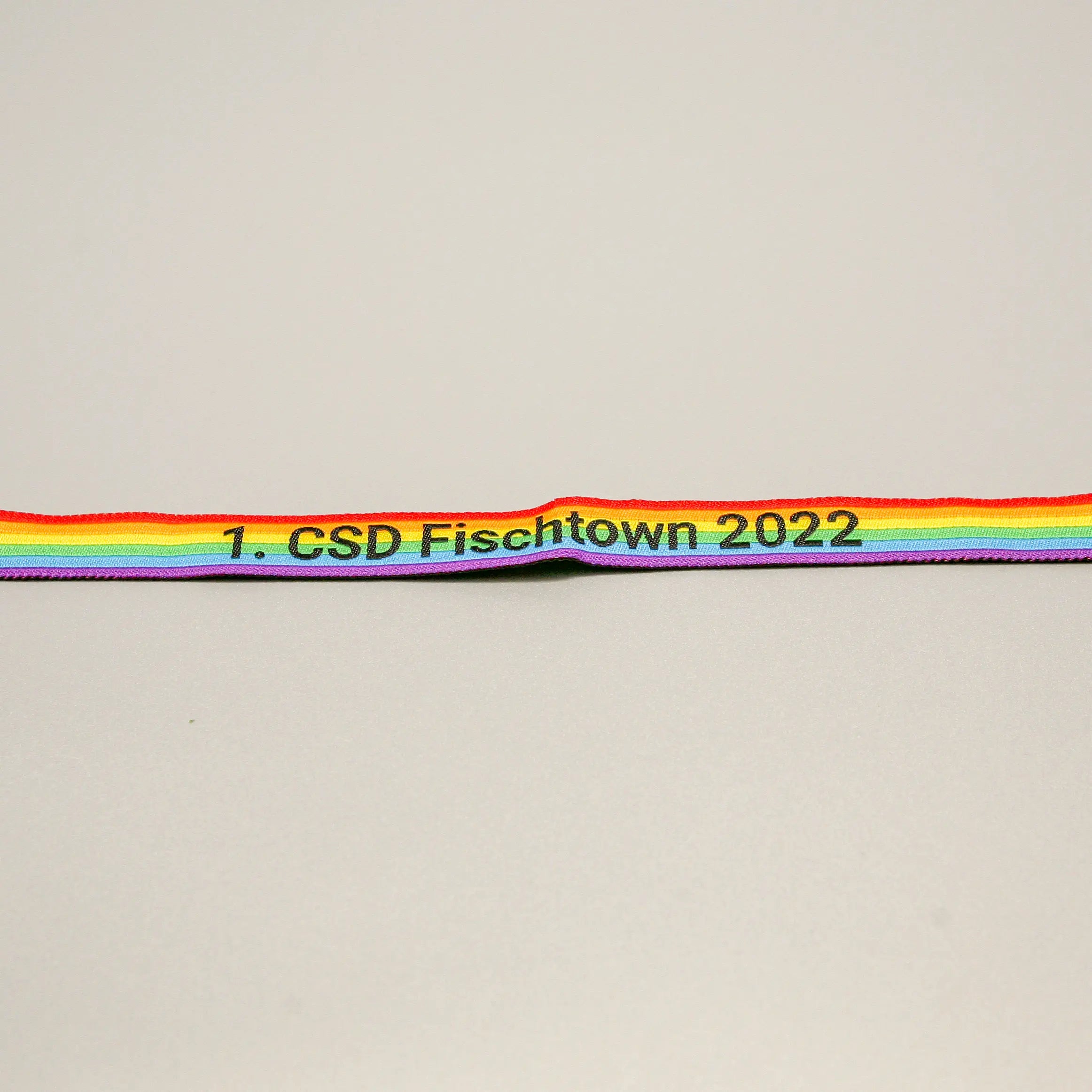 Pride-Armband des CSD Bremerhaven 🌈 (Stoffarmband) - PrideMerch.de - Team Behinderte im Queer Cities e.V.