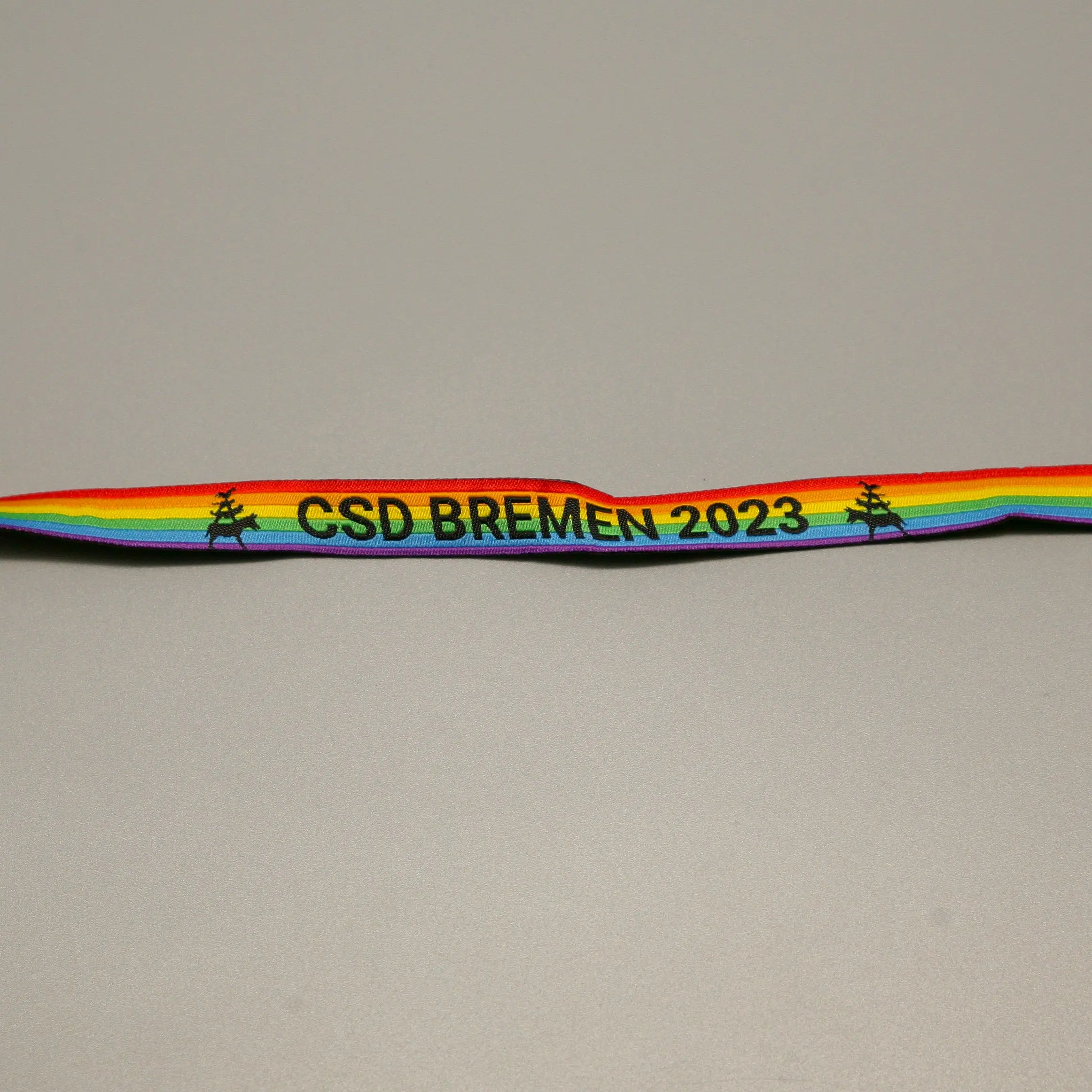 Pride-Armband des CSD Bremen 🌈 (Stoffarmband) - PrideMerch.de - Team Behinderte im Queer Cities e.V.