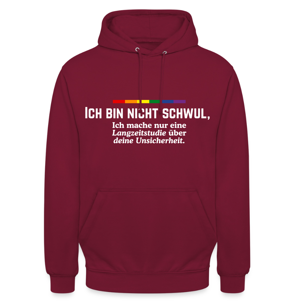 Eleganter Sarkasmus prägt dieses bordeauxrote Hoodie-Design. Die zweizeilige weiße Schrift nimmt fragile Egos aufs Korn, indem sie eine Studie statt Homosexualität vorschiebt: „ICH BIN NICHT SCHWUL, Ich mache nur eine Langzeitstudie über deine Unsicherheit.“ Ein kleiner Regenbogen thront über dem Witz.